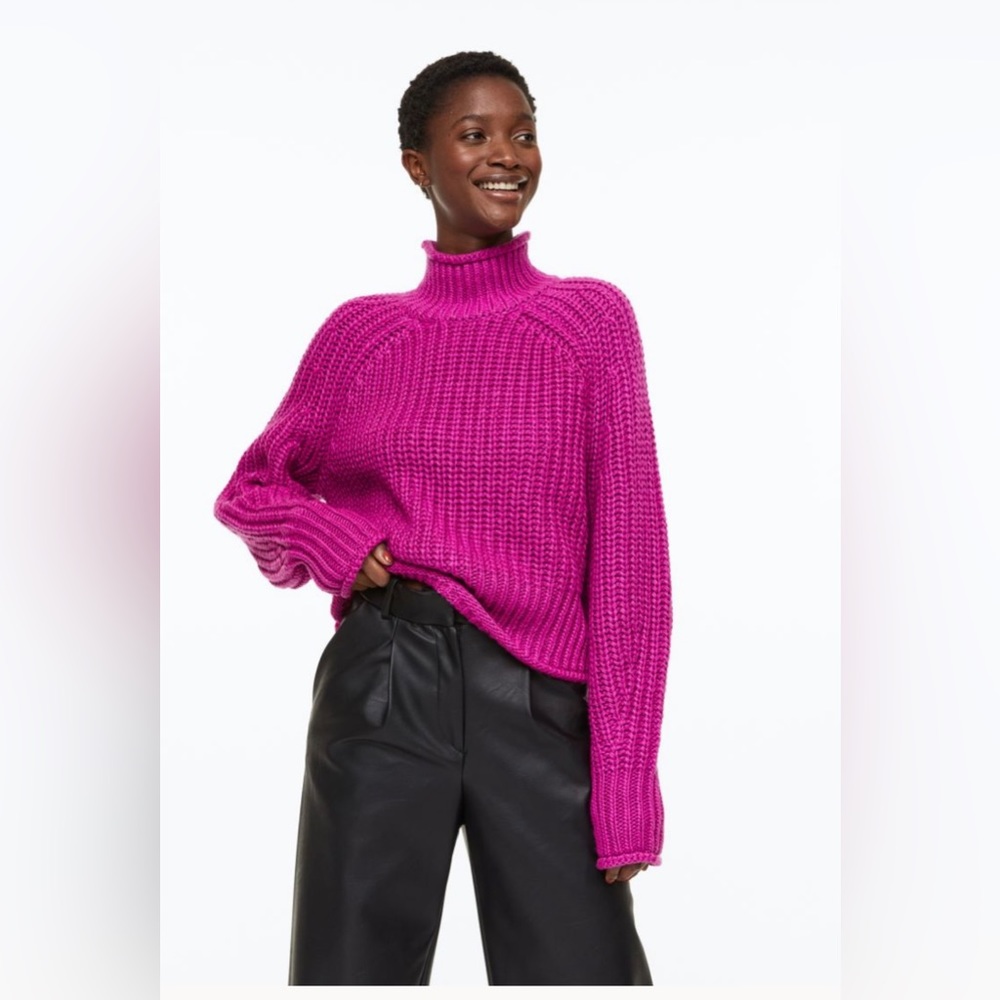 Chunky mock turtleneck sweater in soft, knit fabric with wool content.